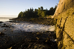 Early morning in Blue Hill Bay. Blue Hill Falls, Maine. Water flows from Salt Pond