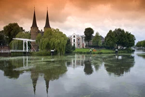 The Eastern Gate and centre along a canal in the city of Delft in the province of South Holland