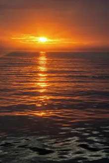 Images Dated 23rd January 2023: Ecuador, Galapagos National Park, Floreana Island. Ocean sunset