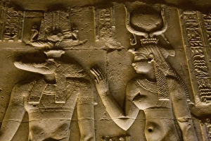Hieroglyphic Prints: Egypt, Kom Ombo. Egyptian gods Sobek, the crocodile and Isis, mother of life on a