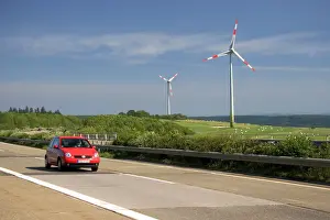 Images Dated 18th June 2006: Electricity wind generators and automobiles traveling on the autobahn in northwest