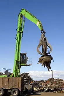 Electromagnetic crane lifting scrap steel for recycling at the Pacific Steel
