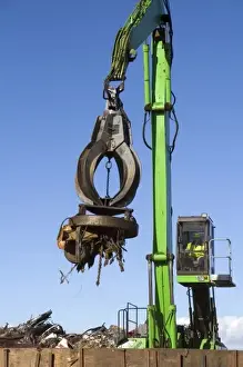 Lift Prints: Electromagnetic crane lifting scrap steel for recycling at the Pacific Steel