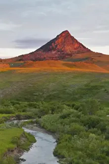 Images Dated 16th July 2011: Elk Creek runs below Haystack Butte at first light near Augusta, Montana, USA