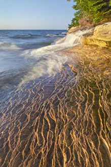 Ledge Prints: Elliot Falls flowing over layers of Au Train Formation sandstone at Miners Beach