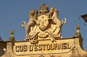 Lincoln Peak Prints: The entrance portico to the elaborately decorated winery with text and coat of arms showing a tower