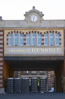 Entry Prints: The entrance to the winery at Champagne Henriot with empty champagne bottles, Reims