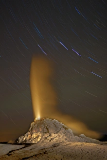 Ecosystem Prints: Eruption of White Dome Geyser under startrails. Fire Hole. Yellowstone National Park