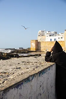Jolly Sienda Prints: Essaouira, Morocco. Watching the sea and a seagull