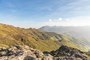 Prints of Ethiopia. Amhara. North Gondar. Road along hillside in the Ethiopian highlands Images Dated 2024 April: Ethiopia. Amhara. North Gondar. Road along hillside in the Ethiopian highlands