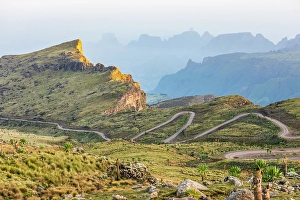 Prints of Ethiopia. Amhara. North Gondar. Winding road in the Ethiopian highlands Images Dated 2024 April: Ethiopia. Amhara. North Gondar. Winding road in the Ethiopian highlands