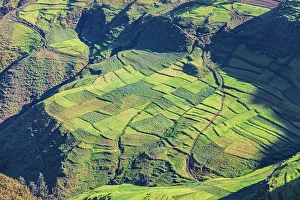 Prints of Ethiopia. Amhara. North Gondar. Farm fields in the Ethiopian highlands Images Dated 2024 April: Ethiopia. Amhara. North Gondar. Farm fields in the Ethiopian highlands