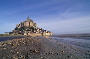 EU, France, Normandy, Le Mont St. Michael Cathedral at low tide