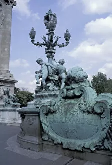 EU, France, Paris. Seine River Bridge and statue