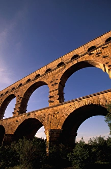 Images Dated 13th June 2011: EU, France, Provence, Gard, Pont du Gard. Roman aqueduct / bridge in sunset light