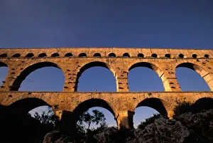 Images Dated 13th June 2011: EU, France, Provence, Gard, Pont du Gard. Roman aqueduct / bridge in sunset light