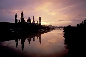 Zaragoza Prints: EU, Spain, Aragon, Zaragoza. Rio Ebro at sunset with Nuestro Senora del Pilar reflected