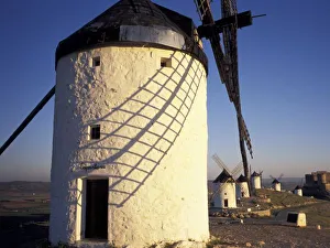 Images Dated 28th July 2004: EU, Spain, Consuegro, La Mancha. Windmills and castle in the distance
