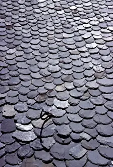 Hook Prints: Europe, Andorra. A metal pole hook breaks the pattern of slate tiles in Andorra