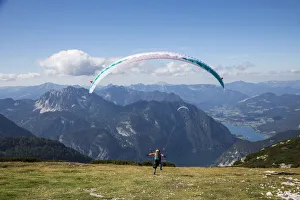 One Person Prints: Europe, Austria, Dachstein, Paragliders as they prepare to take off above Lake Hallstatt