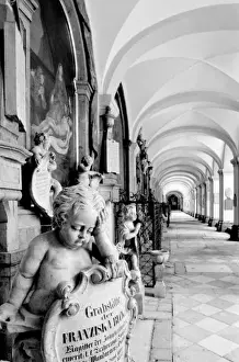 Europe, Austria, Salzburg. Cherub and monument at Sebastianskirche Cemetary