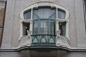 Eclectic Prints: Europe, Belgium, Antwerp. An ornate window in a home in Antwerps historic Zurenborg
