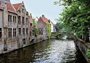Belgium Prints: Europe, Belgium, Brugge. Old stone homes line the canals in Brugge, a World Heritage Site