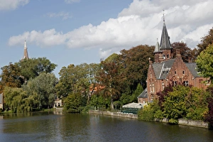 Cruise Prints: Europe, Belgium, Brugges. Brick church on Minnewater
