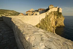 Images Dated 9th October 2006: Europe, Croatia, Dalmatia, Dubrovnik. View of historic houses and Adriatic Sea