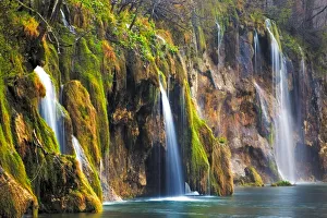 Europe, Croatia, Plitvice Lakes National Park. Waterfalls into stream. Credit as