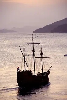 Passenger Prints: Europe, Croatia. Sight seeing tall ship in the port of Dubrovnik at sunset