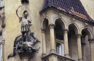 Sword Prints: Europe, Czech Republic, Prague. Statue on old building with balcony