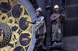 Calendar Prints: Europe, Czech Republic, Prague. Two figures next to the Old Town Clock Tower Calendar