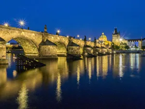 Natural World Prints: Europe, Czech Republic, Prague. Charles bridge water reflection at night