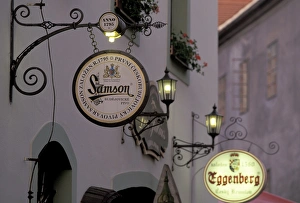 Advertisement Prints: Europe, Czech Republic, South Bohemia, Cesky Krumlov Inner town cafe signs, evening