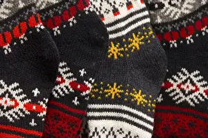 Baltic Prints: Europe, Estonia, Tallinn. Detail of colorful wool socks at a market in Raekoja Plats