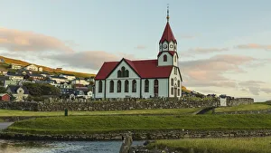Images Dated 11th August 2020: Europe, Faroe Islands. View of the Sandavags kirkja, a church in the village of