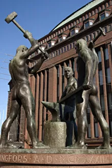 Europe, Finland, Helsinki. The Three Smiths statues in Three Smiths Square