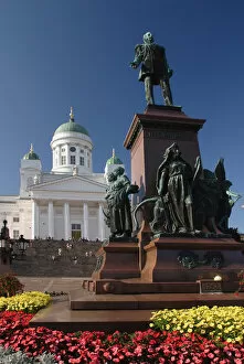 Europe, Finland, Helsinki. The statue of Alexander II in Senate Square with Lutheran