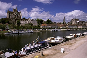 Europe, France, Burgundy, Auxerre. View of Cathedral and Yonne River barges