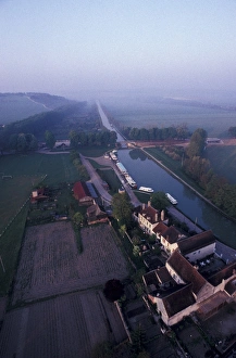 Burgundy Prints: Europe, France, Burgundy, Tanlay. Aerial view of Burgundy Canal from hot air balloon