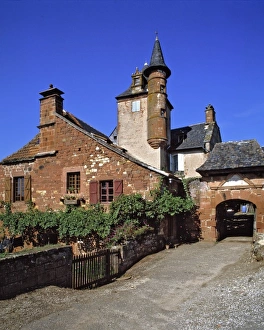 Red Sandstone Prints: Europe, France, Collognes-la-Rouge. Red sandstone buildings and turrets abound in
