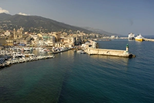 Images Dated 4th May 2006: Europe, France, Corsica, Bastia. Vieux Port and St Nicholas Harbor visible from ramparts