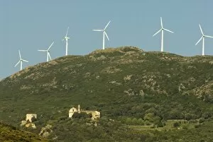 Images Dated 5th May 2006: Europe, France, Corsica, Maccinagio. Blend of old and new with modern windpower turbines