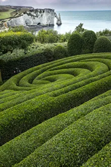 Normandy Prints: Europe, France, Etretat. Swirling design in formal garden