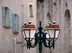 Shallow Depth Of Field Prints: Europe, France, Forcalquier. Old weathered buildings form a backdrop for this charming