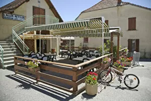 Europe, France, French Alps. An empty cafe waits for customers in a small village