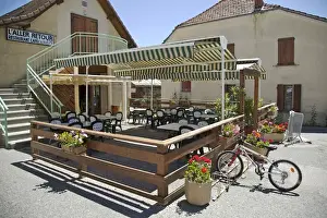 Josh Anon Prints: Europe, France, French Alps. An empty cafe waits for customers in a small village