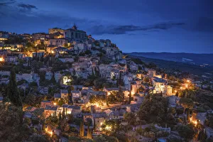 Lighting Prints: Europe, France, Gordes. Hillside town at twilight