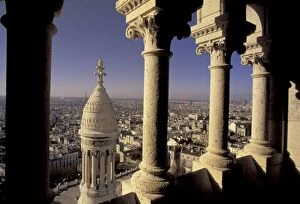 Europe, France, Paris, View of Paris through arches from Sacre Coeur Basilica